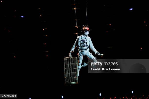 Performers perform during the "Cirque Du Soleil's Quidam" Press Preview at The George Mason University Patriot Center on July 17, 2013 in Fairfax,...