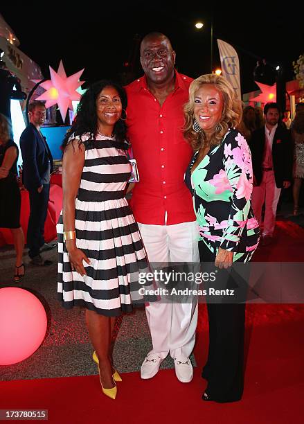 Cookie Johnson, Earvin 'Magic' Johnson and Denise Rich attend the Denise Rich annual St. Tropez party on July 17, 2013 in Saint-Tropez, France.