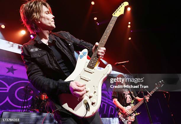 John Rzeznik and Robby Takac of the Goo Goo Dolls perform onstage at Gibson Amphitheatre on July 17, 2013 in Universal City, California.