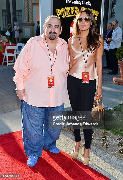 Actor Ken Davitian and actress Wedil David arrive at The Children's Charity Of Southern California Texas Hold 'Em Poker Tournament hosted by Variety...