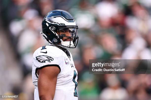 Jalen Hurts of the Philadelphia Eagles looks on during the first half in the game against the New York Jets at MetLife Stadium on October 15, 2023 in...