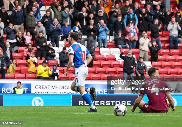 Blackburn Rovers' Joseph Rankin-Costello celebrates scoring the opening goal during the Sky Bet Championship match between Blackburn Rovers and...