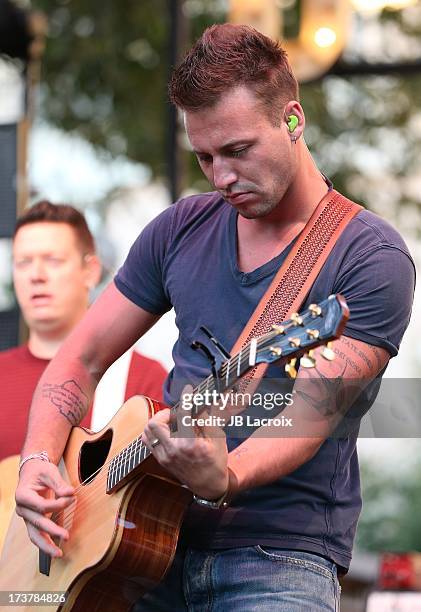 Eric Gunderson of Love And Theft performs at The Grove on July 17, 2013 in Los Angeles, California.