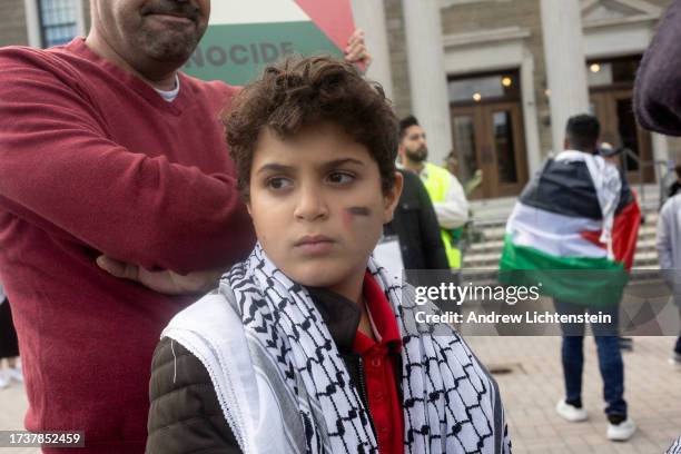 Members of the the Muslim community of Nassau County gather for a rally in support of Palestine and to protest the Israeli bombardment of Gaza, on...