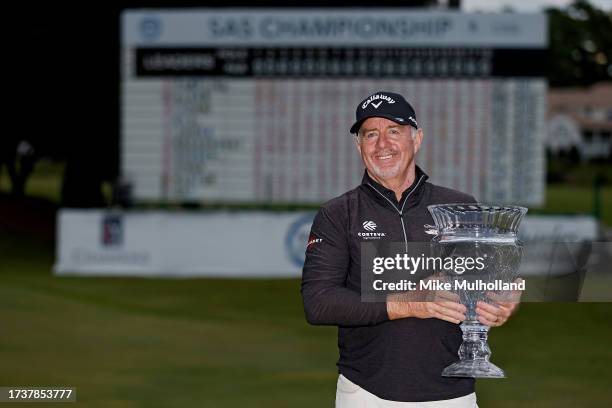 Rod Pampling of Australia poses with the trophy after winning the SAS Championship at Prestonwood Country Club on October 15, 2023 in Cary, North...