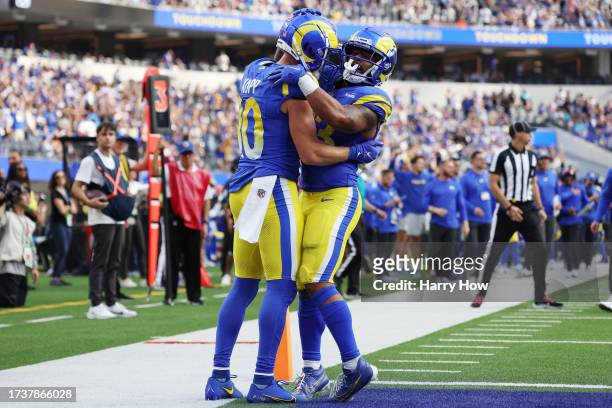 Cooper Kupp and Kyren Williams of the Los Angeles Rams celebrate after a touchdown during the third quarter against the Arizona Cardinals at SoFi...