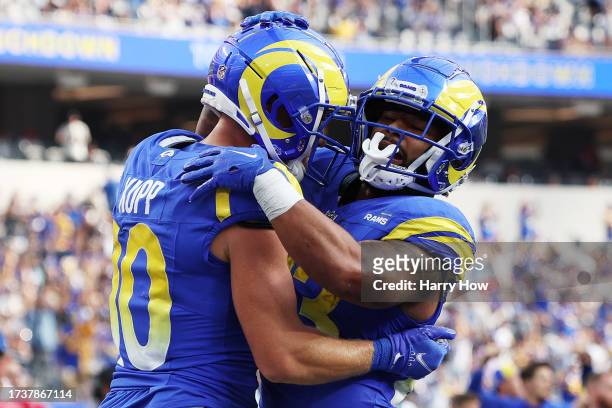 Cooper Kupp and Kyren Williams of the Los Angeles Rams celebrate after a touchdown during the third quarter against the Arizona Cardinals at SoFi...
