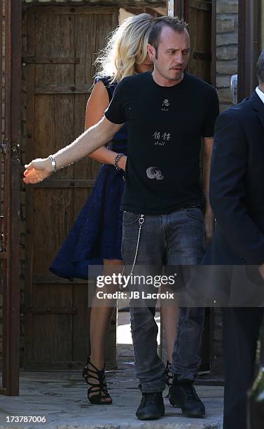 Roberto Zincone and Malin Akerman are seen on July 17, 2013 in Los Angeles, California.