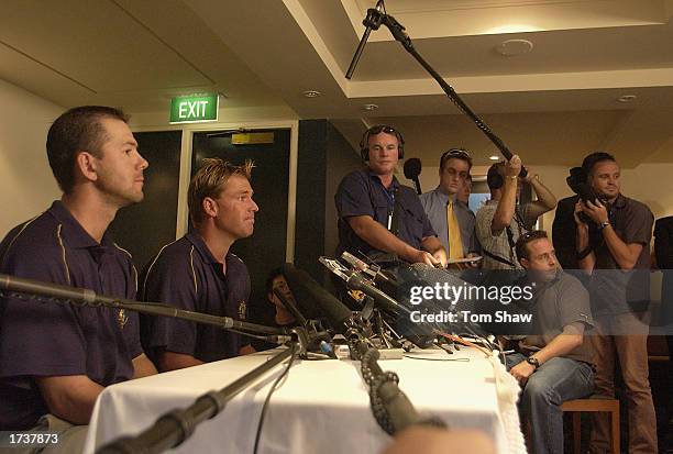 Shane Warne of Australia talks to the press to announce his retirement from One Day International cricket after the forthcoming World Cup at the Quay...