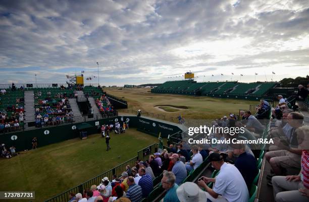 Peter Senior of Australia hits the opening tee shot on the 1st hole to commence the first round of the 142nd Open Championship at Muirfield on July...