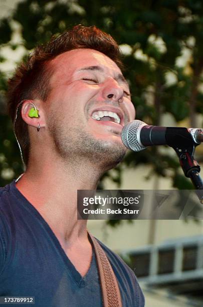 Musician Eric Gunderson of Love And Theft performs at The 2013 Summer Concert Series at The Grove on July 17, 2013 in Los Angeles, California.
