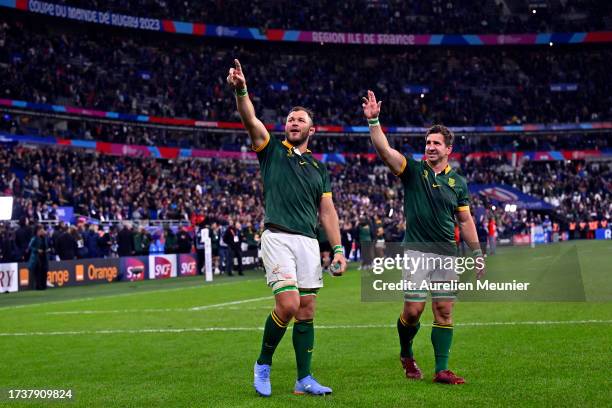 Kwagga Smith and Duane Vermeulen of South Africa salute the fans after winning the Rugby World Cup France 2023 Quarter Final match between France and...