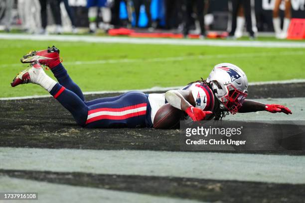 Rhamondre Stevenson of the New England Patriots celebrates after scoring a rushing touchdown during the fourth quarter against the Las Vegas Raiders...