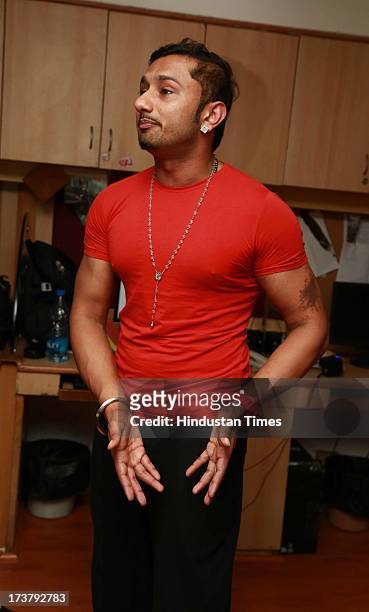 Indian Punjabi and Bollywood singer Honey Singh poses for the camera during an exclusive profile shoot at HT Media office on July 9, 2013 in New...