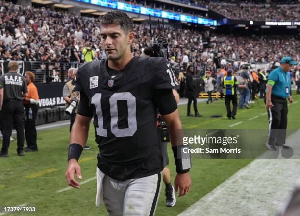Jimmy Garoppolo of the Las Vegas Raiders walks off the field in the first half against the New England Patriots at Allegiant Stadium on October 15,...