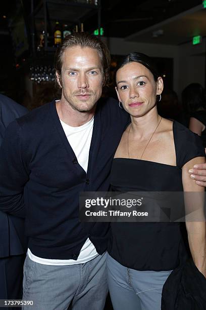 Actor Jason Lewis and Satsuki Mitchell attend the Grand Opening of Del Frisco's Grille on July 17, 2013 in Santa Monica, California.