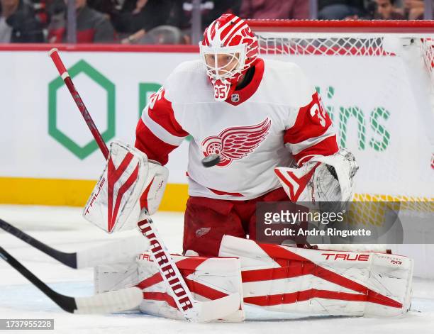 Ville Husso of the Detroit Red Wings makes a save against the Ottawa Senators at Canadian Tire Centre on October 21, 2023 in Ottawa, Ontario, Canada.