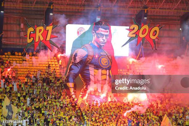 Fans show their support during the Saudi Pro League week 10 match between Al Nassr and Damak at Al-Awwal Park, in Riyadh, Saudi Arabia on October 21,...