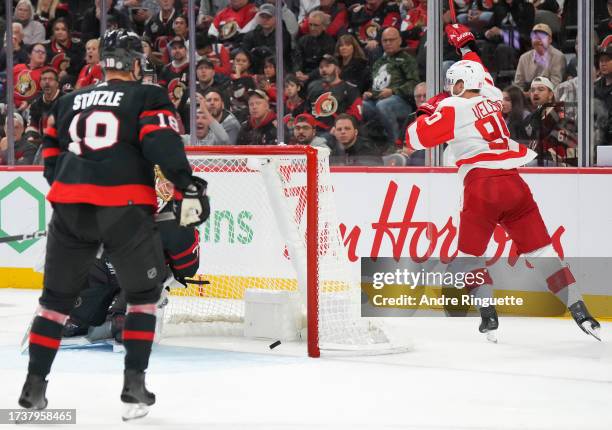 Joe Veleno of the Detroit Red Wings celebrates his second period goal against against the Joonas Korpisalo of Ottawa Senators at Canadian Tire Centre...