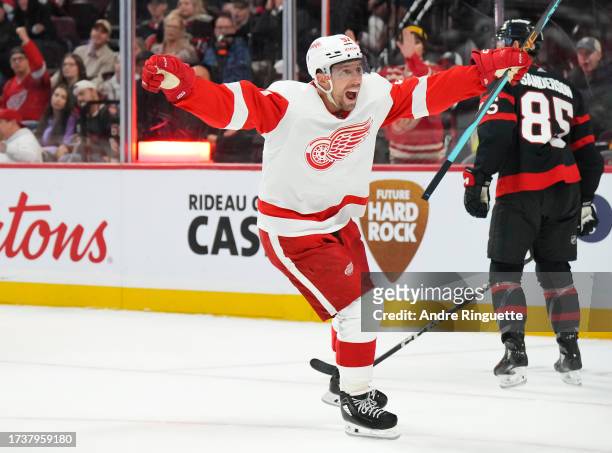 David Perron of the Detroit Red Wings celebrates his second period goal against the Ottawa Senators at Canadian Tire Centre on October 21, 2023 in...