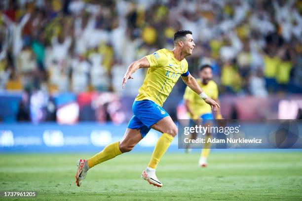 Cristiano Ronaldo of Al Nassr FC celebrates after scoring during the Saudi Pro League football match between Al Nassr and Damac Club at Al Awal Park...