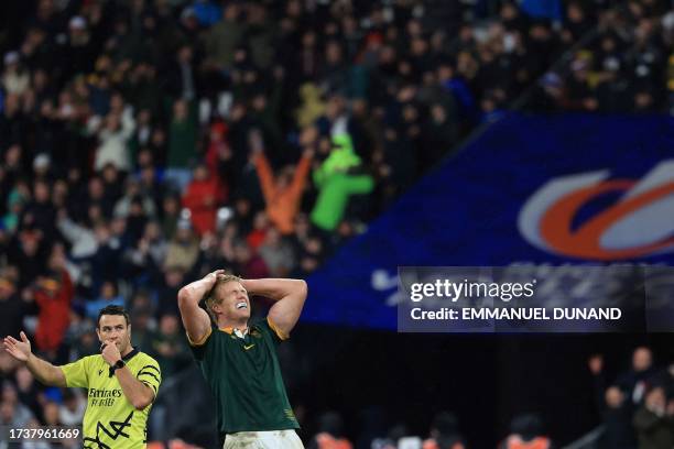 South Africa's openside flanker Pieter-Steph du Toit reacts as New Zealand referee Ben O'Keeffe blows the final whistle as South Africa wins the...