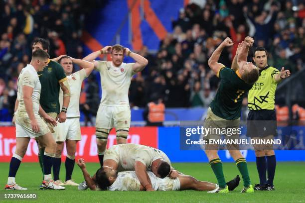 South Africa's openside flanker Pieter-Steph du Toit reacts after South Africa won the France 2023 Rugby World Cup semi-final match between England...