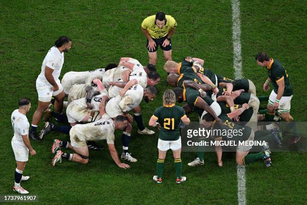South Africa's scrum-half Faf de Klerk prepares to feed the ball into a South Arica scrum during the France 2023 Rugby World Cup semi-final match...