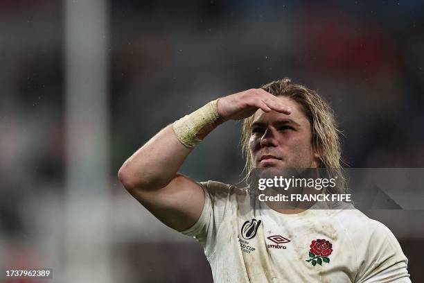 South Africa's scrum-half Faf de Klerk, wearing an England jersey, reacts after South Africa won the France 2023 Rugby World Cup semi-final match...