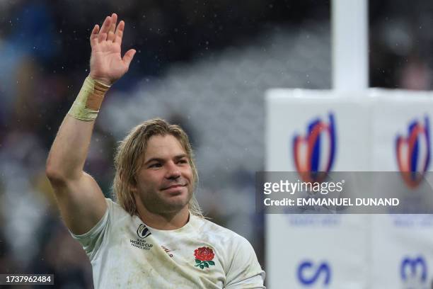 South Africa's scrum-half Faf de Klerk, wearing an England jersey, gestures after South Africa won the France 2023 Rugby World Cup semi-final match...