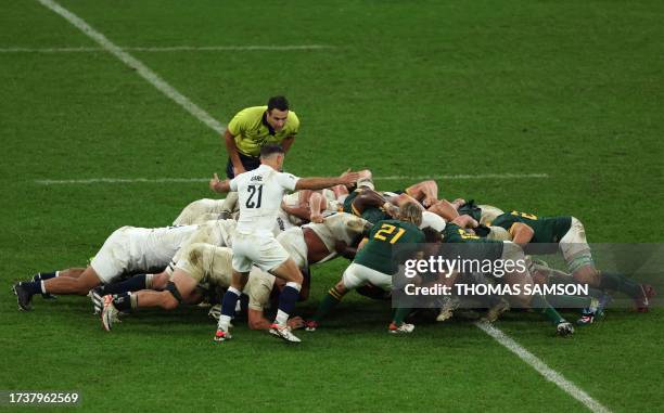 South Africa's scrum-half Faf de Klerk feeds the ball into a South Arica scrum during the France 2023 Rugby World Cup semi-final match between...