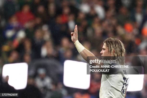 South Africa's scrum-half Faf de Klerk celebrates after winning the France 2023 Rugby World Cup semi-final match between England and South Africa at...