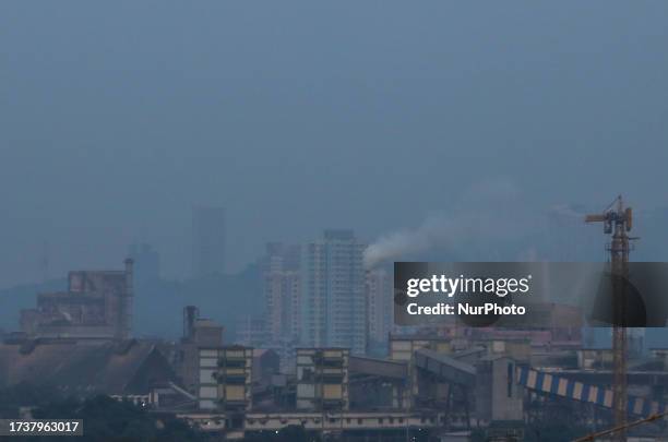 General view of buildings covered with smog, in Mumbai, India, 21 October, 2023.