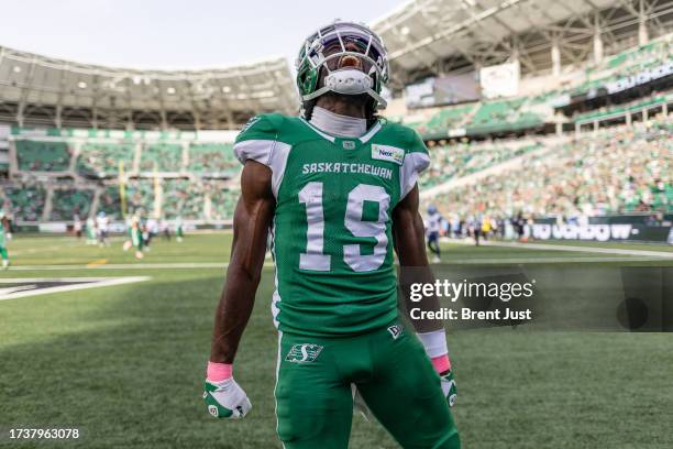 Samuel Emilus of the Saskatchewan Roughriders celebrates after a touchdown in the game between the Toronto Argonauts and Saskatchewan Roughriders at...