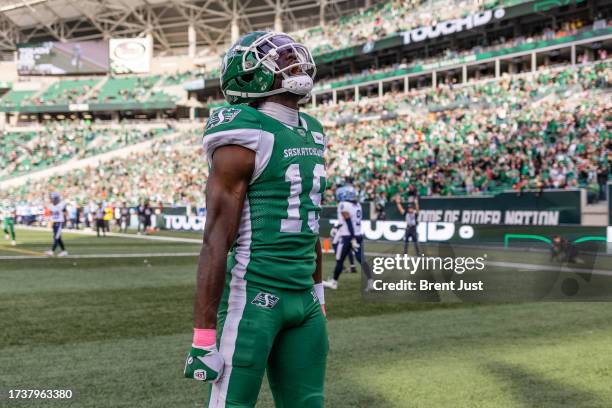 Samuel Emilus of the Saskatchewan Roughriders celebrates after a touchdown in the game between the Toronto Argonauts and Saskatchewan Roughriders at...