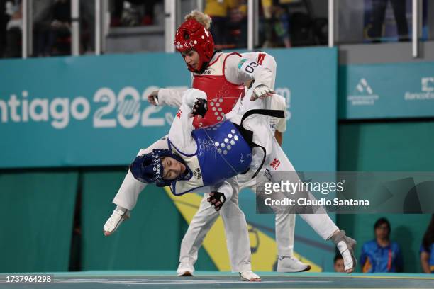 Andrea Ramirez of Colombia fights against Daniela Souza of Mexico in Women´s Kyrougi - 48kg finals at Parque Deportivo Estadio Nacional on day 1 of...
