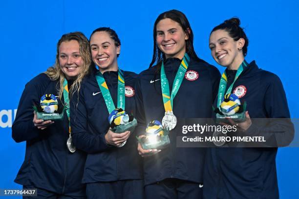 Women swimming team Amy Fulmer, Catherine De Loof, Kayla Wilson and Gabriela Albiero, celebrate after winning the silver medal during the women's...