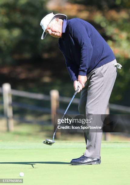 Kirk Triplett watches his putt on the 17th green during the second round of the Dominion Energy Charity Classic on October 21 at The Country Club of...