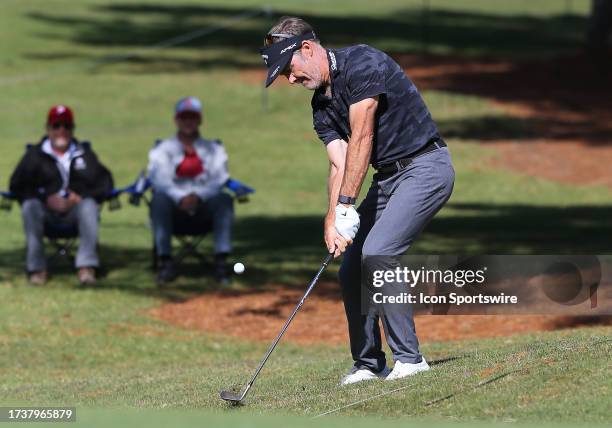 Stuart Appleby watches his chip shot onto the 17th green during the second round of the Dominion Energy Charity Classic on October 21 at The Country...