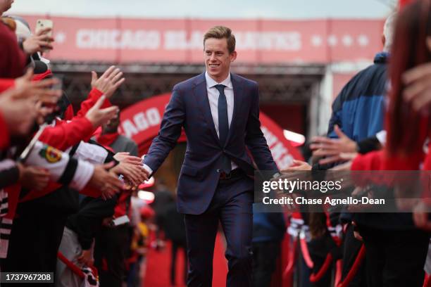 Connor Murphy of the Chicago Blackhawks walks down the red carpet during pregame ceremonies prior to the game against the Vegas Golden Knights at the...