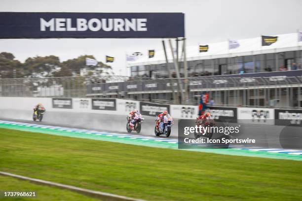 Francesco BAGNAIA of Italy on the Ducati Lenovo Team DUCATI and Fabio DI GIANNANTONIO of Italy on the Gresini Racing MotoGP DUCATI sprinting during...