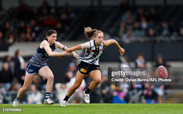 Darcy Moloney of the Cats and Mikala Cann of the Magpies compete for the ball during the 2023 AFLW Round 08 match between The Collingwood Magpies and...