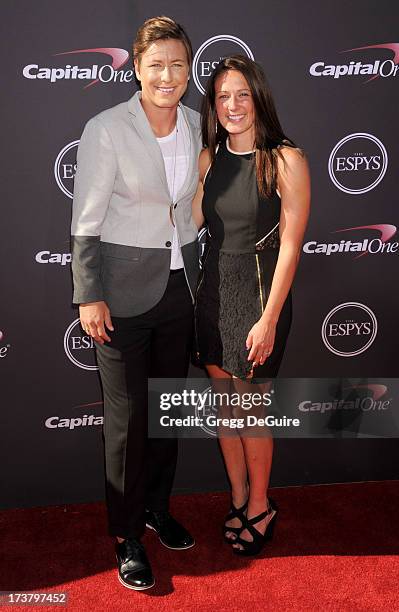 Professional soccer player Abby Wambach and Sarah Huffman arrive at the 2013 ESPY Awards at Nokia Theatre L.A. Live on July 17, 2013 in Los Angeles,...