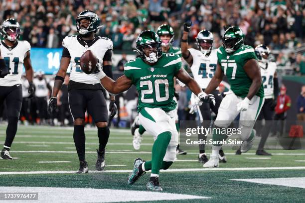 Breece Hall of the New York Jets celebrates a touchdown during the fourth quarter in the game against the Philadelphia Eagles at MetLife Stadium on...