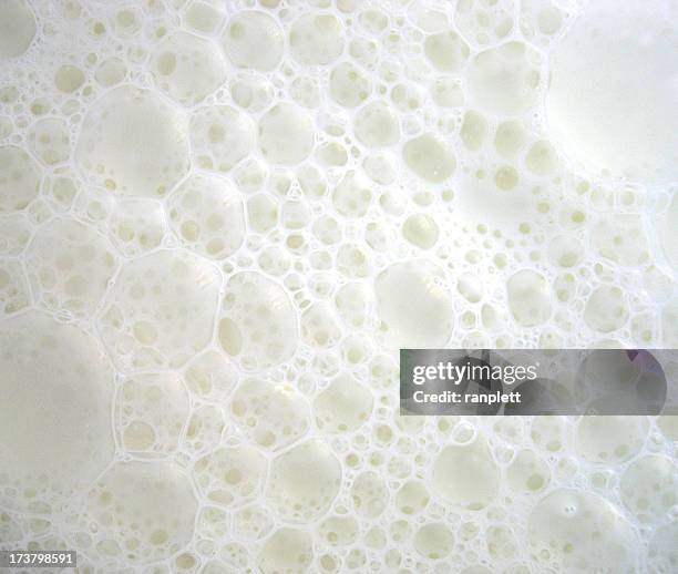 frothy milk bubble pattern - food white background stock pictures, royalty-free photos & images