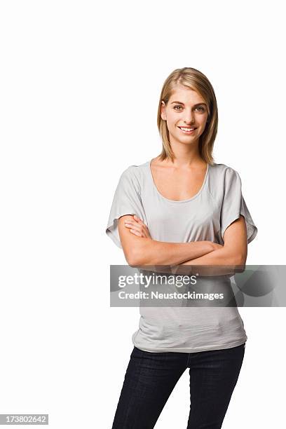 young woman against isolated white background - girl standing crossed arms studio stock pictures, royalty-free photos & images