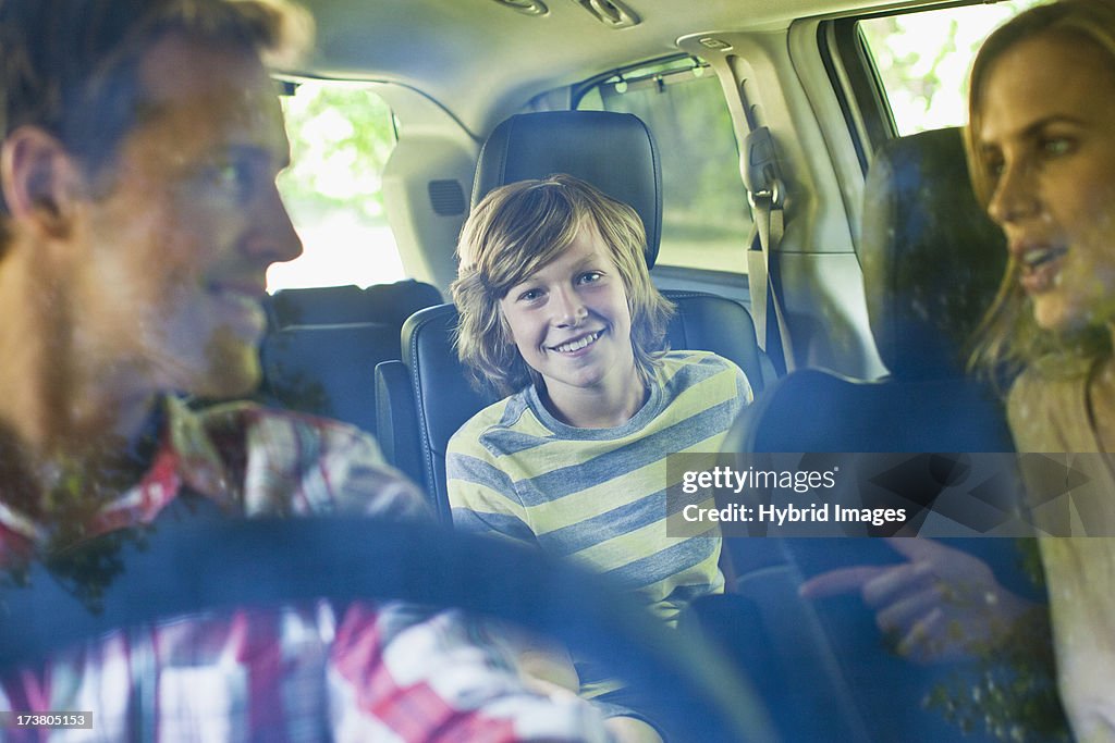 Family riding in car together