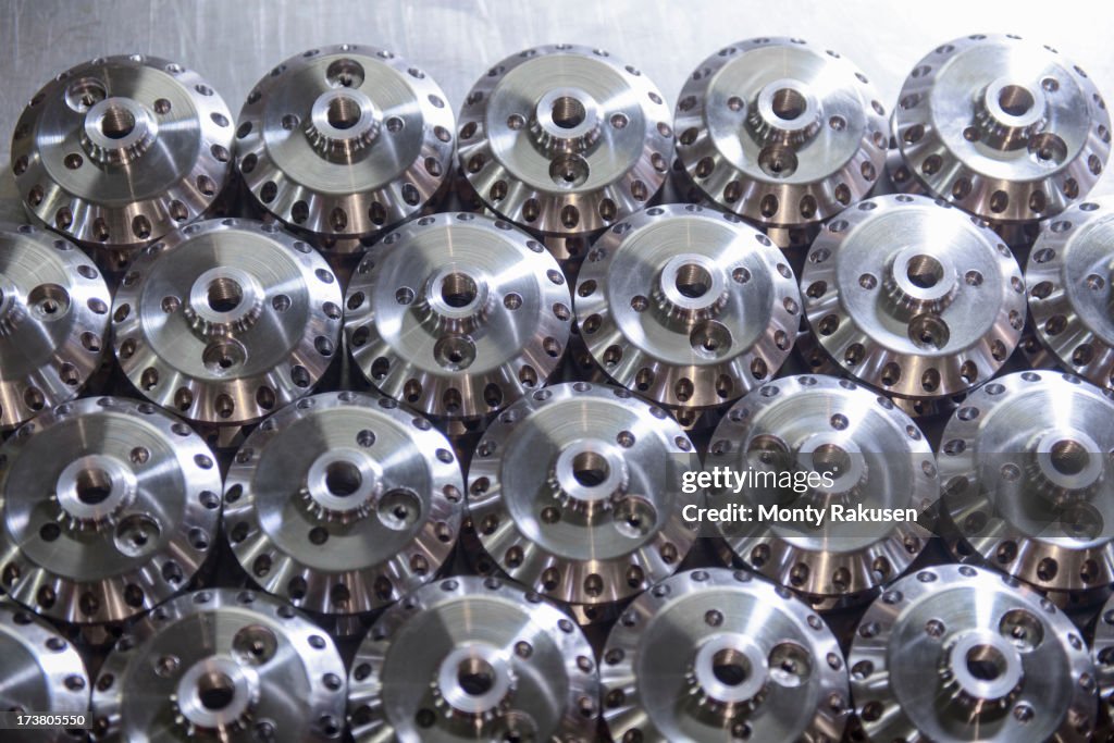 Large group of steel engineering parts in factory