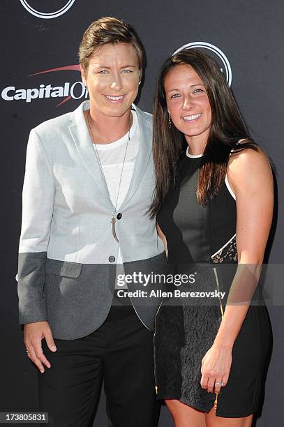 Women's soccer player Abby Wambach and Sarah Huffman arrive at the 2013 ESPY Awards at Nokia Theatre L.A. Live on July 17, 2013 in Los Angeles,...