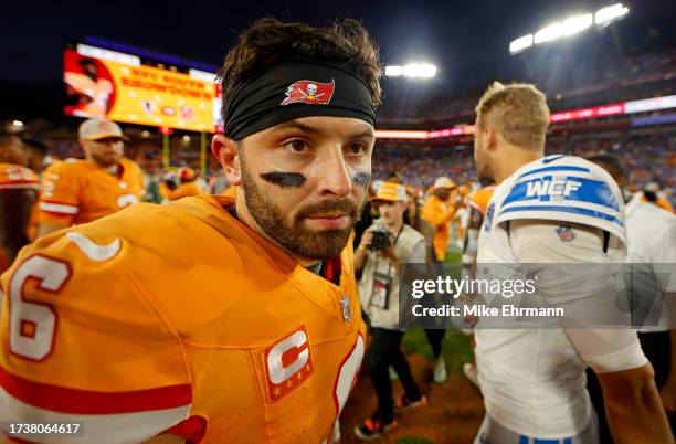 Baker Mayfield of the Tampa Bay Buccaneers shakes hands with Jared Goff of the Detroit Lions during a game at Raymond James Stadium on October 15,...